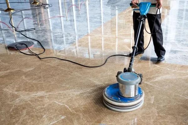 Cleaning mop on wooden floor